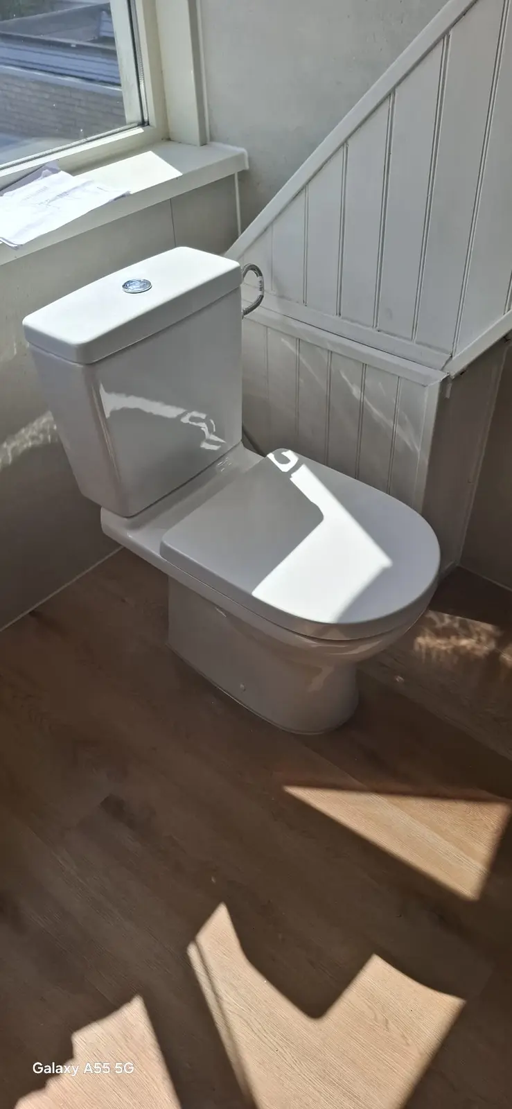 Marmerlook badkamer na renovatie