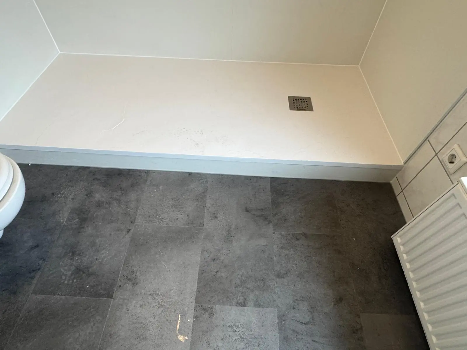 Marmerlook badkamer voor renovatie